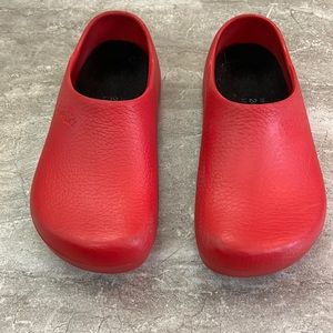 Birkenstock women healthcare worker shoes, bright red. Plastic uppers and soles.